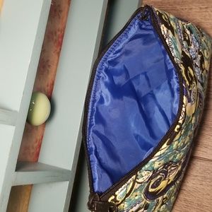 Quilted paisley  women's makeup bag .